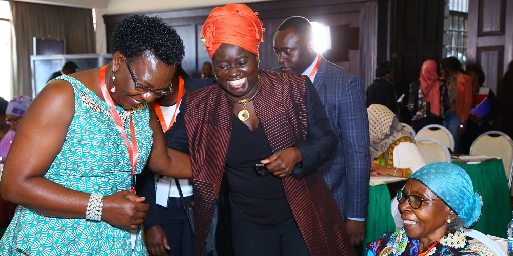 Conference on Education of Girls and Women in Conflict and Post-Conflict situations: Ms. Martha Muhwezi, the current FAWE Executive Director (left) shares a light moment with the founding Executive Director Prof. Eddah Gachukia (seated) and Dr. Codou Diaw, the third Executive Director of FAWE Africa.