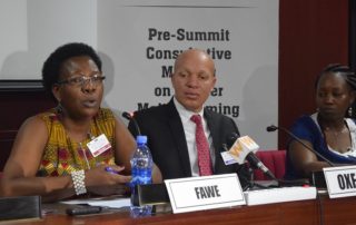 FAWE's Martha Muhwezi, Acting Executive Director and the Chair of GIMAC (left) leads the panel discussion on the education of refugees, IDPs, and returnees